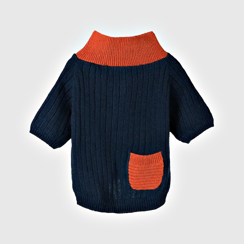 Back of navy ribbed dog sweater with orange knit pocket
