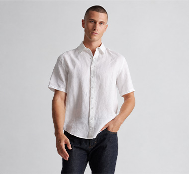Man wearing a white short-sleeve button-front shirt