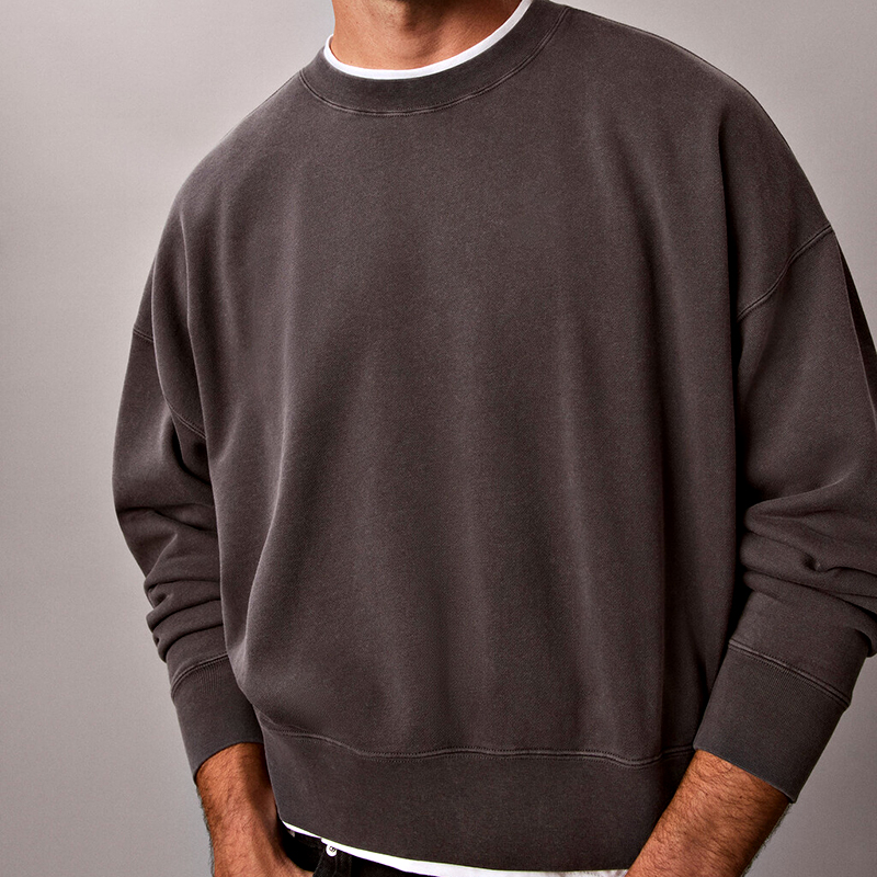 Finished garment-dyed sweatshirt flat lay
