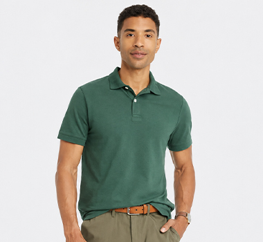 Man wearing a dark green short-sleeve polo shirt.