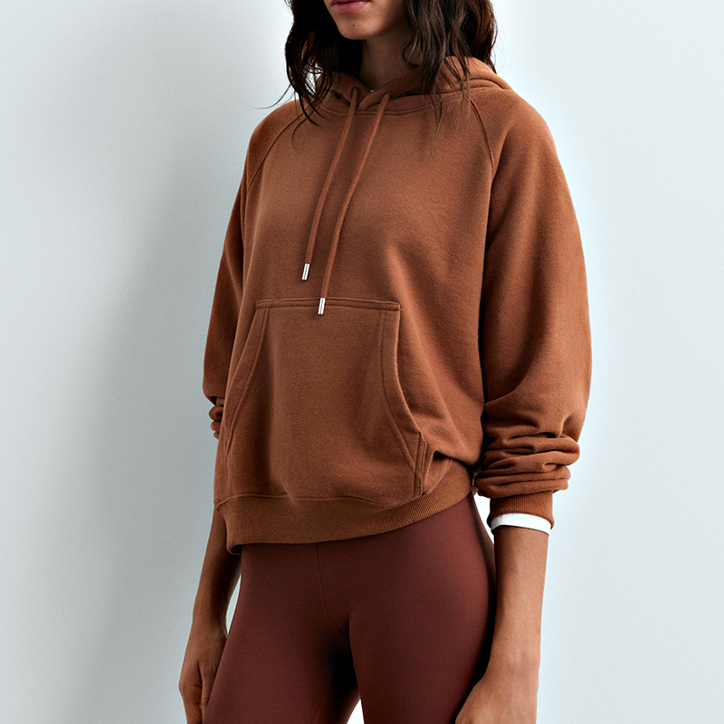 Camel fleece hoodie showing kangaroo pocket and tipped drawcords