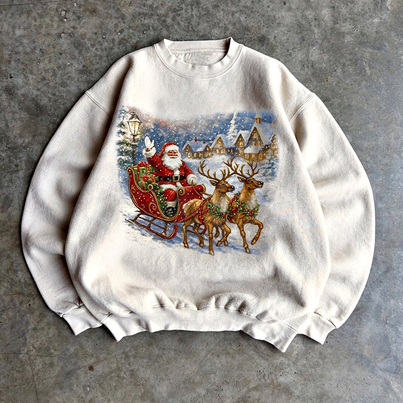 Cream crewneck sweatshirt laid flat showing relaxed drape and ribbed hem