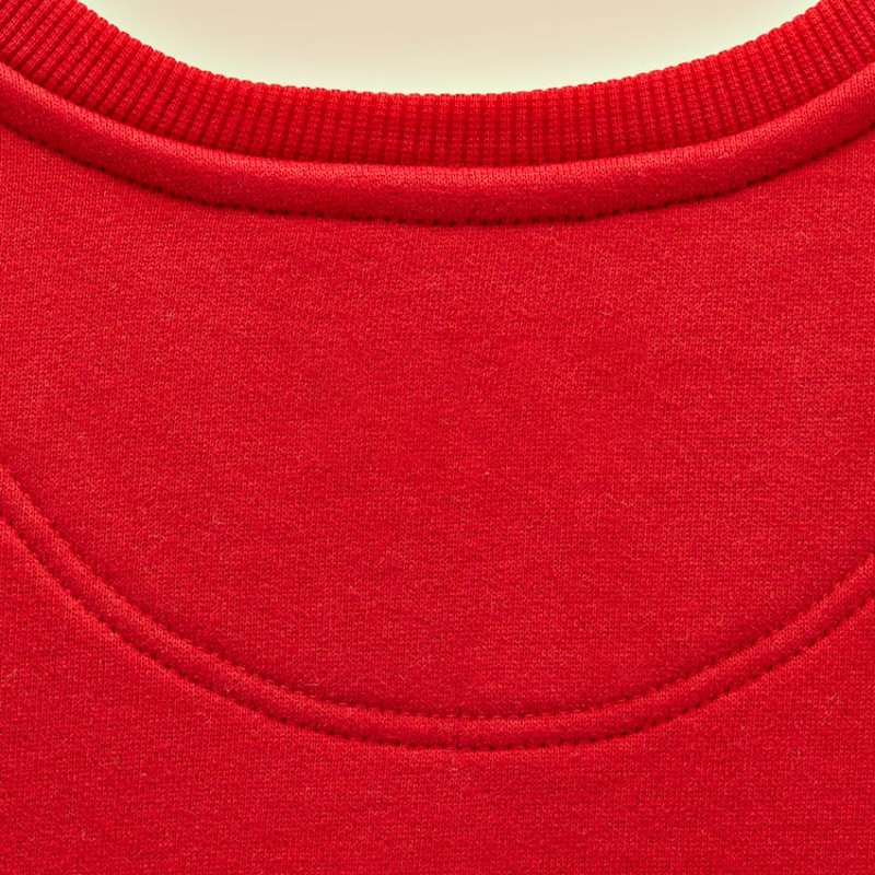 Close-up of the ribbed cuff and hem trim of the crewneck sweatshirt