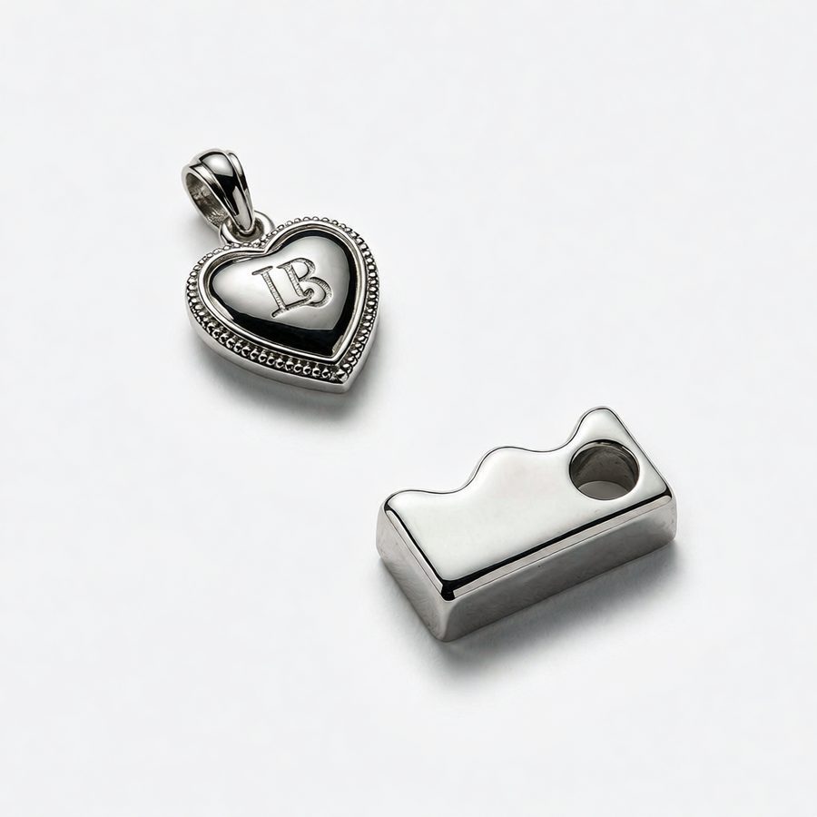 Close-up of 925 silver pendant and silver bar showing metal texture