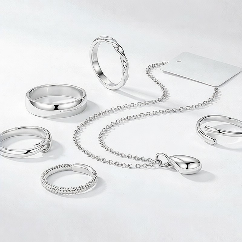 Private label 925 silver jewelry displayed with a brand tag