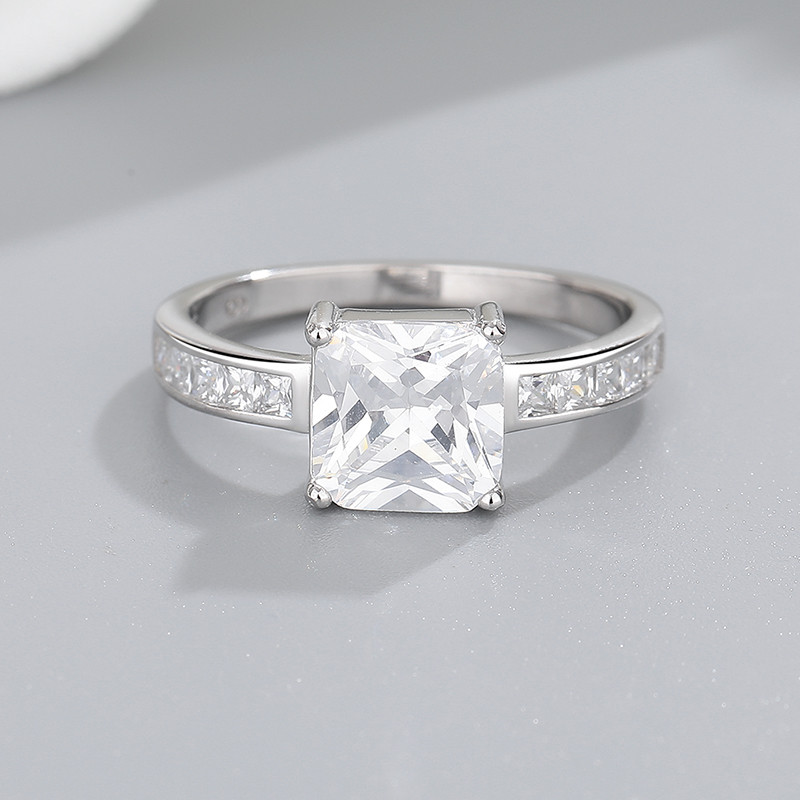square CZ solitaire ring with baguette shoulders detail
