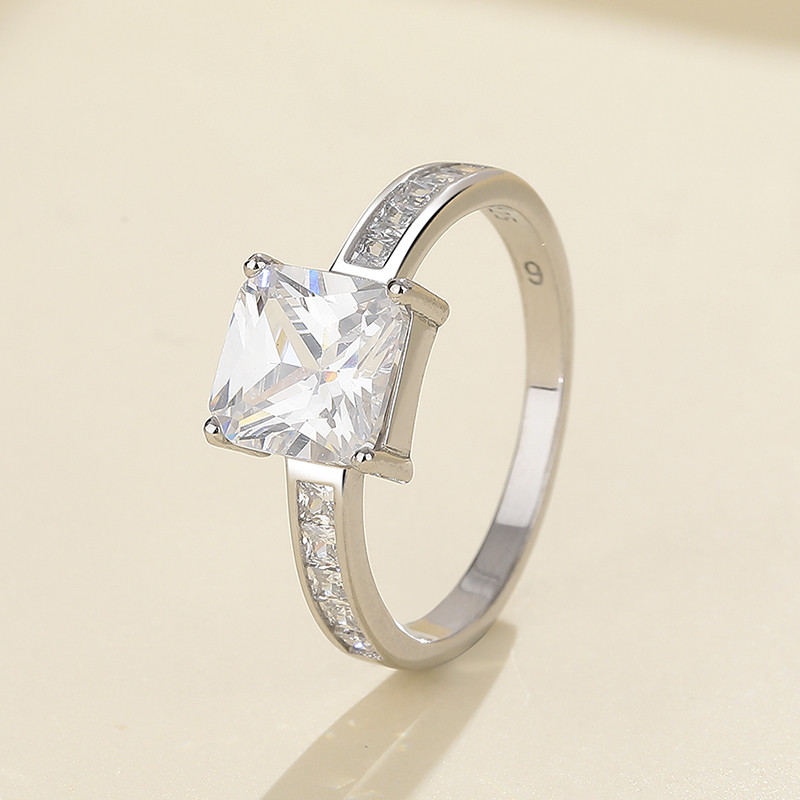 square CZ solitaire ring with baguette shoulders in 925 sterling silver