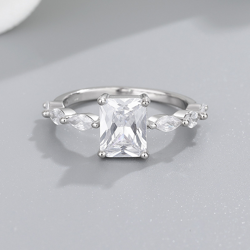 emerald cut CZ ring with marquise side stones detail
