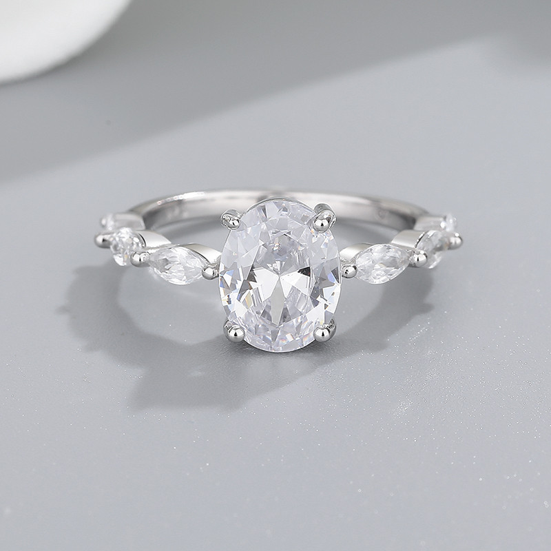 oval cut CZ engagement rings with marquise accents detail