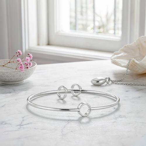 925 sterling silver bracelet and necklace on marble