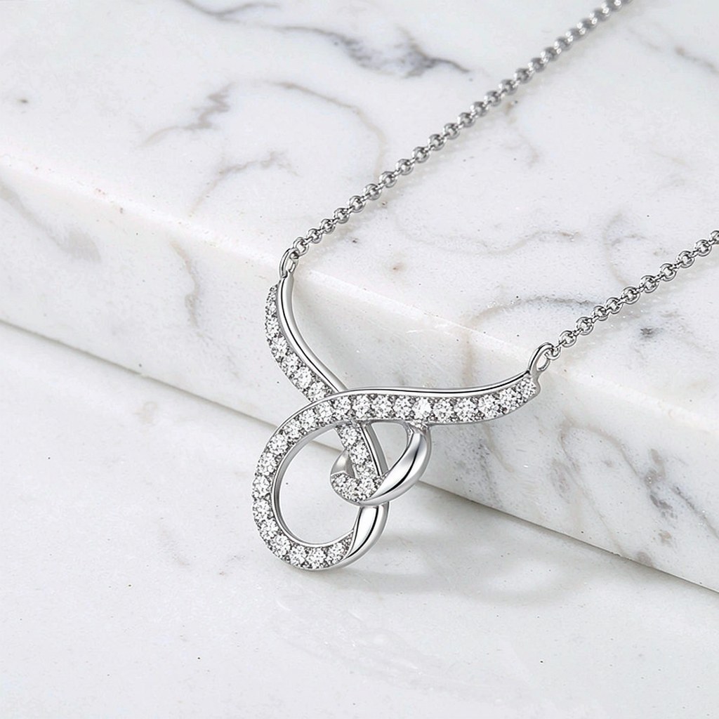 Intertwined Knot Pave Pendant Necklaces detail view