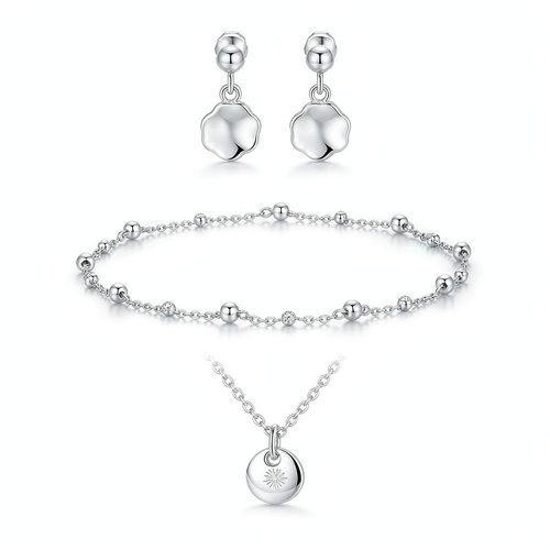 Custom 925 silver bridesmaid jewelry flat lay with earrings, bracelet, and engraved pendant