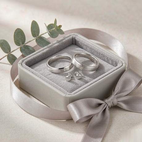 Sterling silver rings and stud earrings presented in a gift box with a satin ribbon