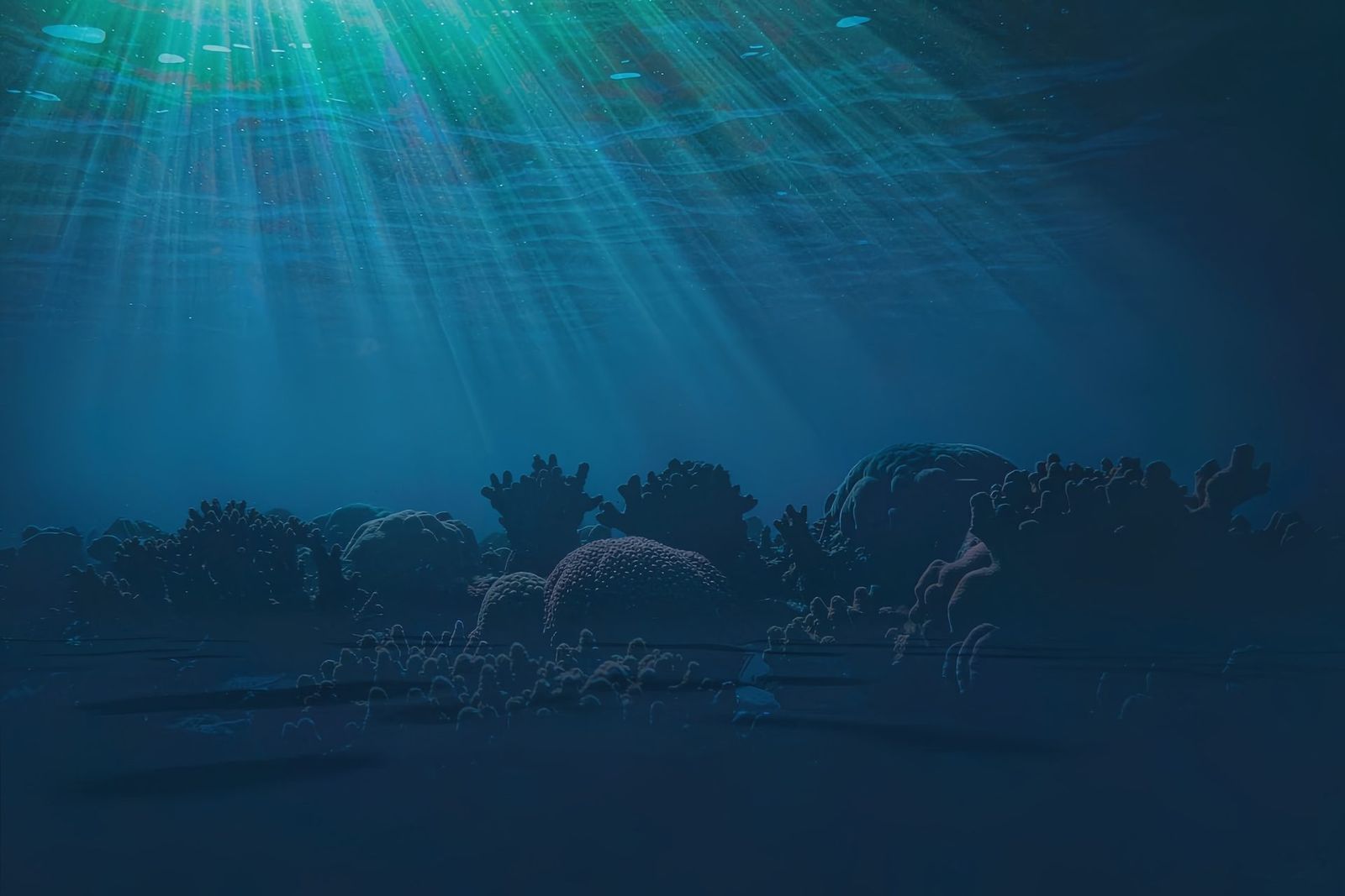 Sunlight falling through deep blue ocean water