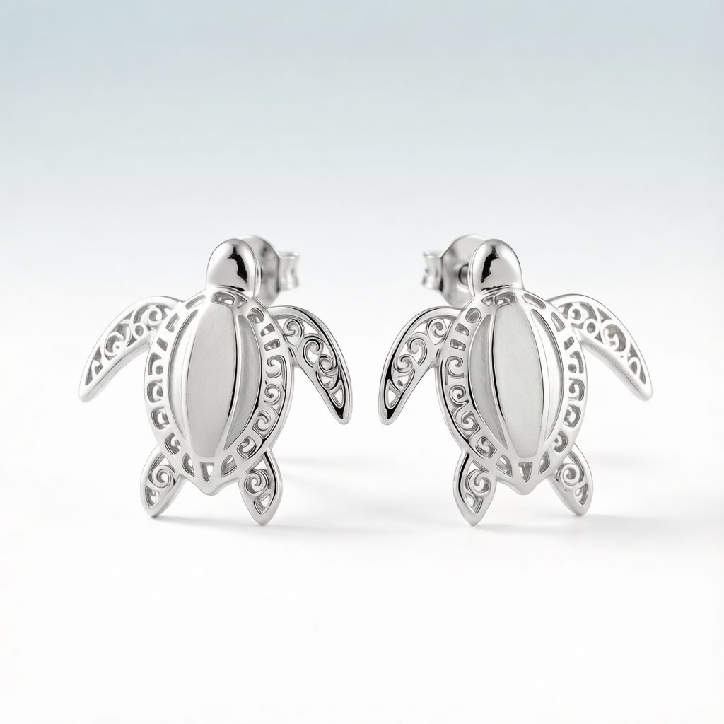 Sterling silver sea turtle stud earrings with filigree shell detailing
