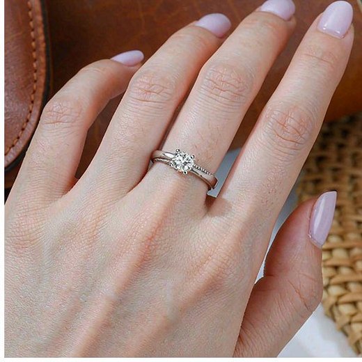 925 silver cubic zirconia ring worn on a model's hand in a lifestyle scene