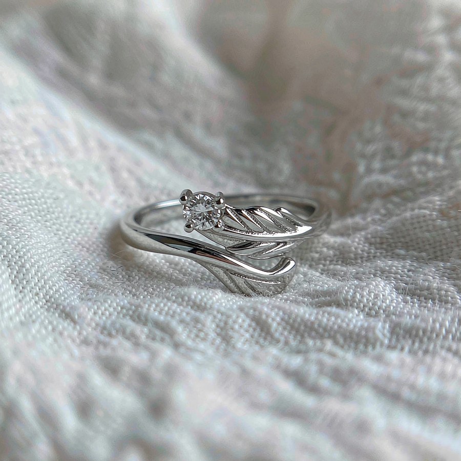 Sterling silver phoenix tail ring with clear stone