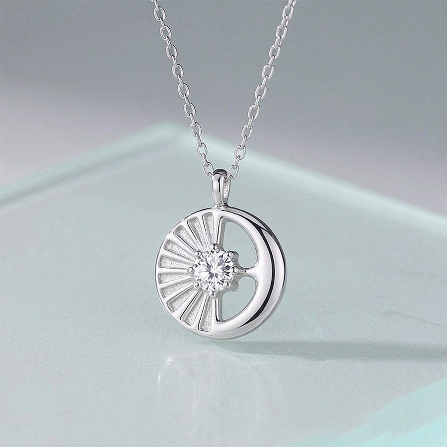 Sterling silver sun and moon pendant with clear stone