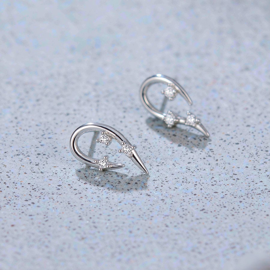 Sterling silver Aries crescent moon earrings with star motifs