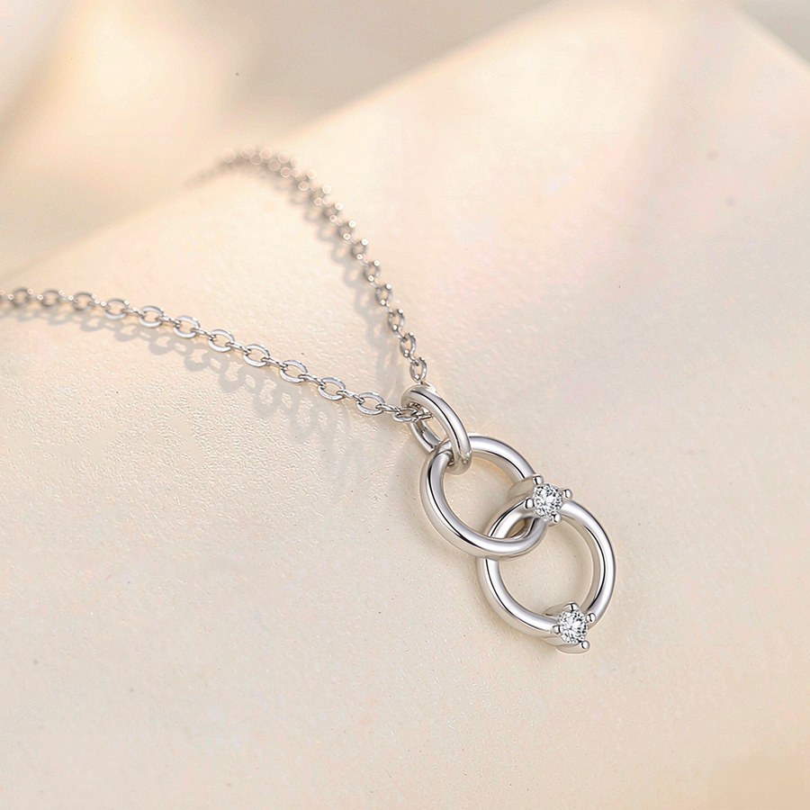 Sterling silver Gemini interlocking circle necklace with diamonds