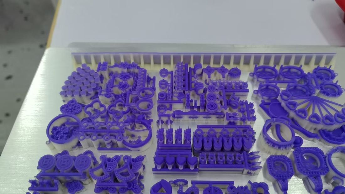 Blue wax models of Hengdian Silver designs on the printing frame