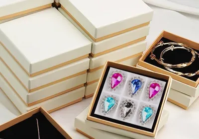 Branded cardboard box with foam lining for claw rhinestones